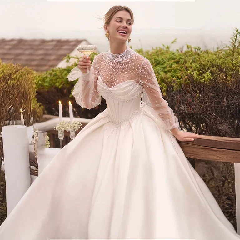 Model wearing a white gonw