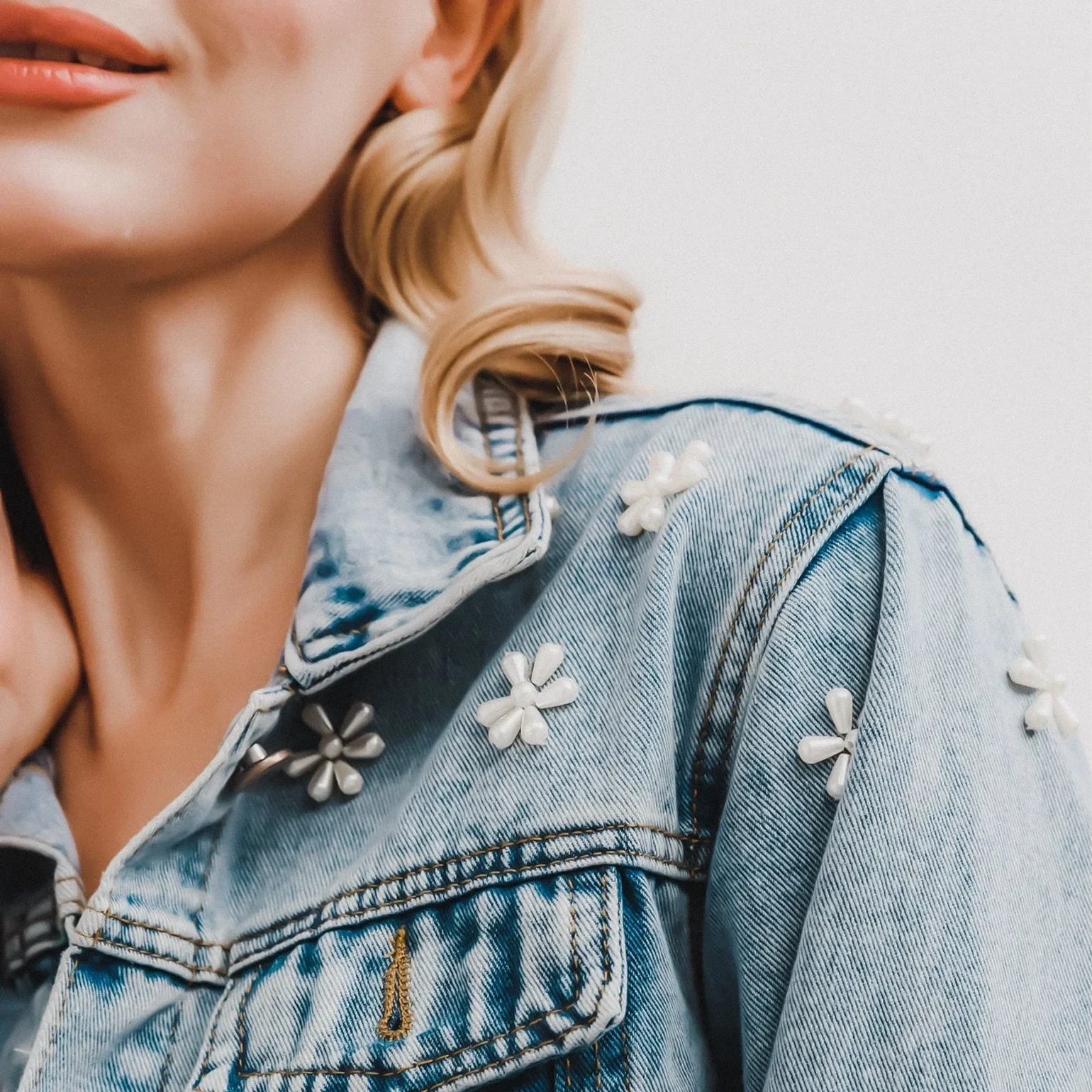Image of a model wearing a denim jacket.
