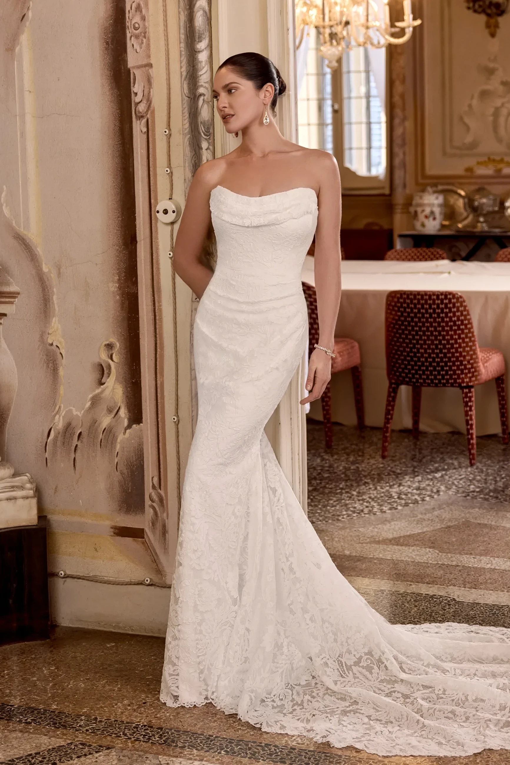 Model wearing a gown by Justin Alexander