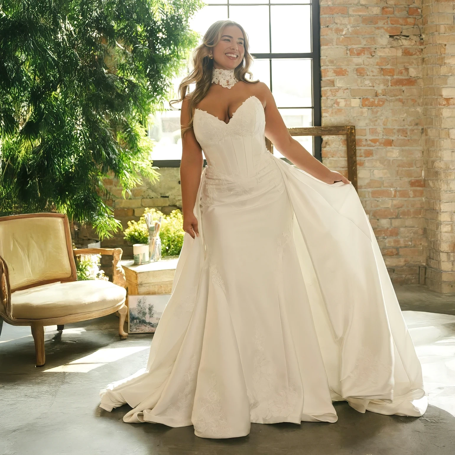 Model wearing a white gonw